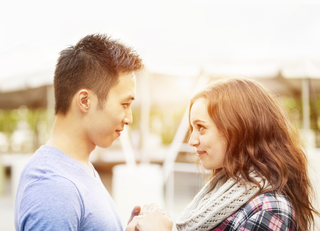 Young couple affectionately facing each other